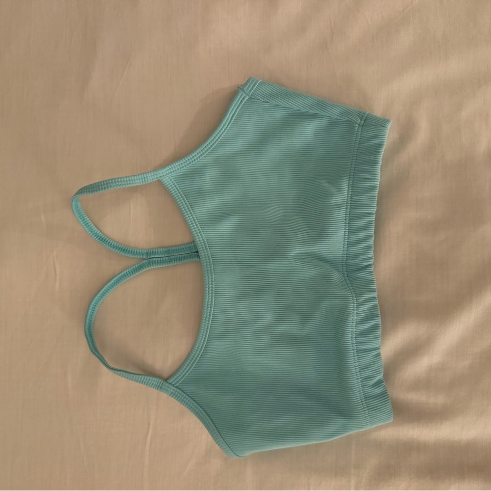 LAST CHANCE! 
Kenny Flowers Aqua Sports Top